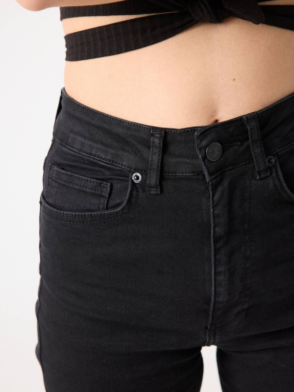 High waist black flared jeans black middle back view