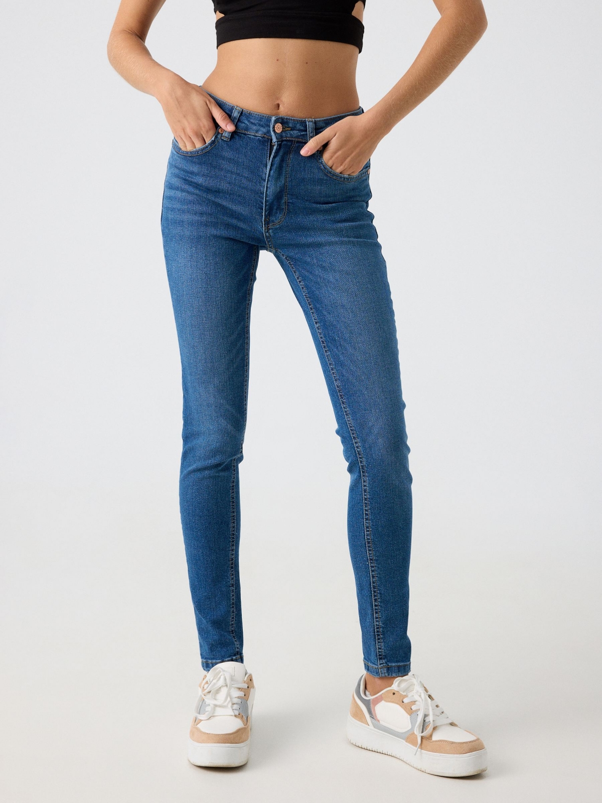 Mid-rise skinny jeans with washed effect ducat blue middle front view