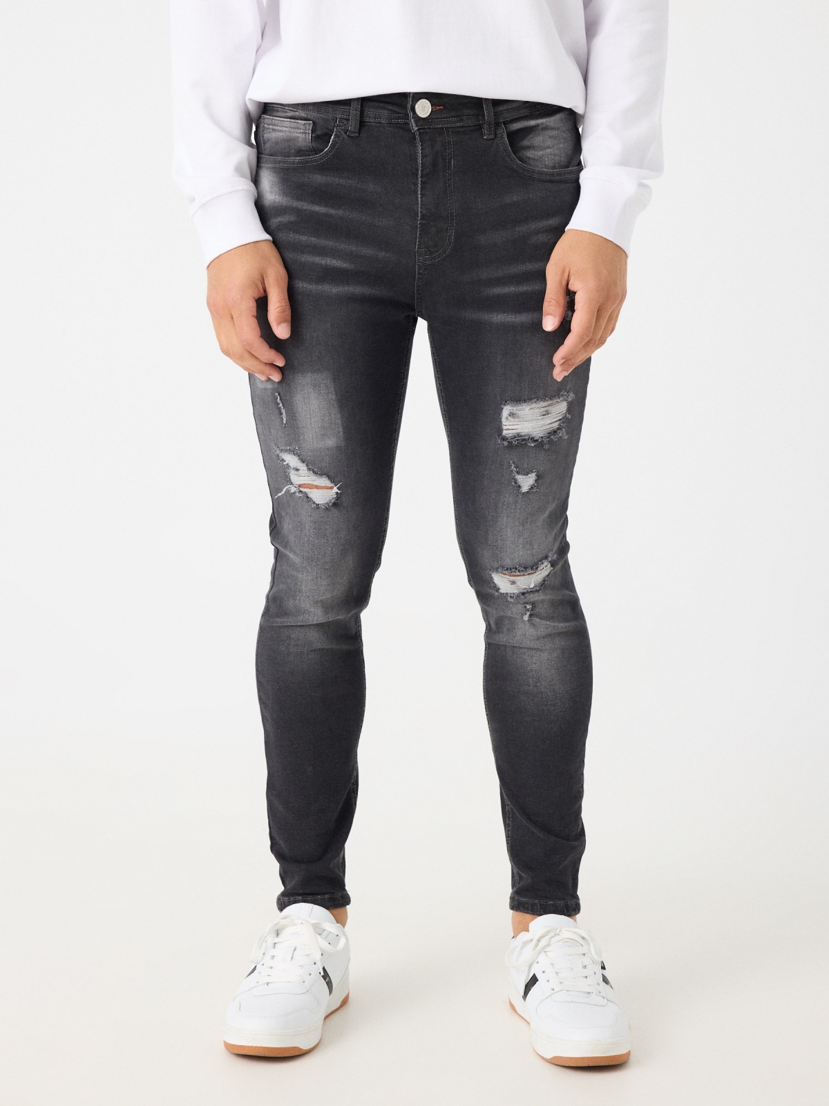 Ripped carrot jeans black middle front view