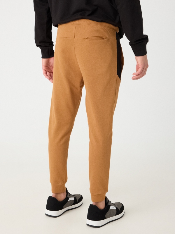 Jogger pants light brown middle back view
