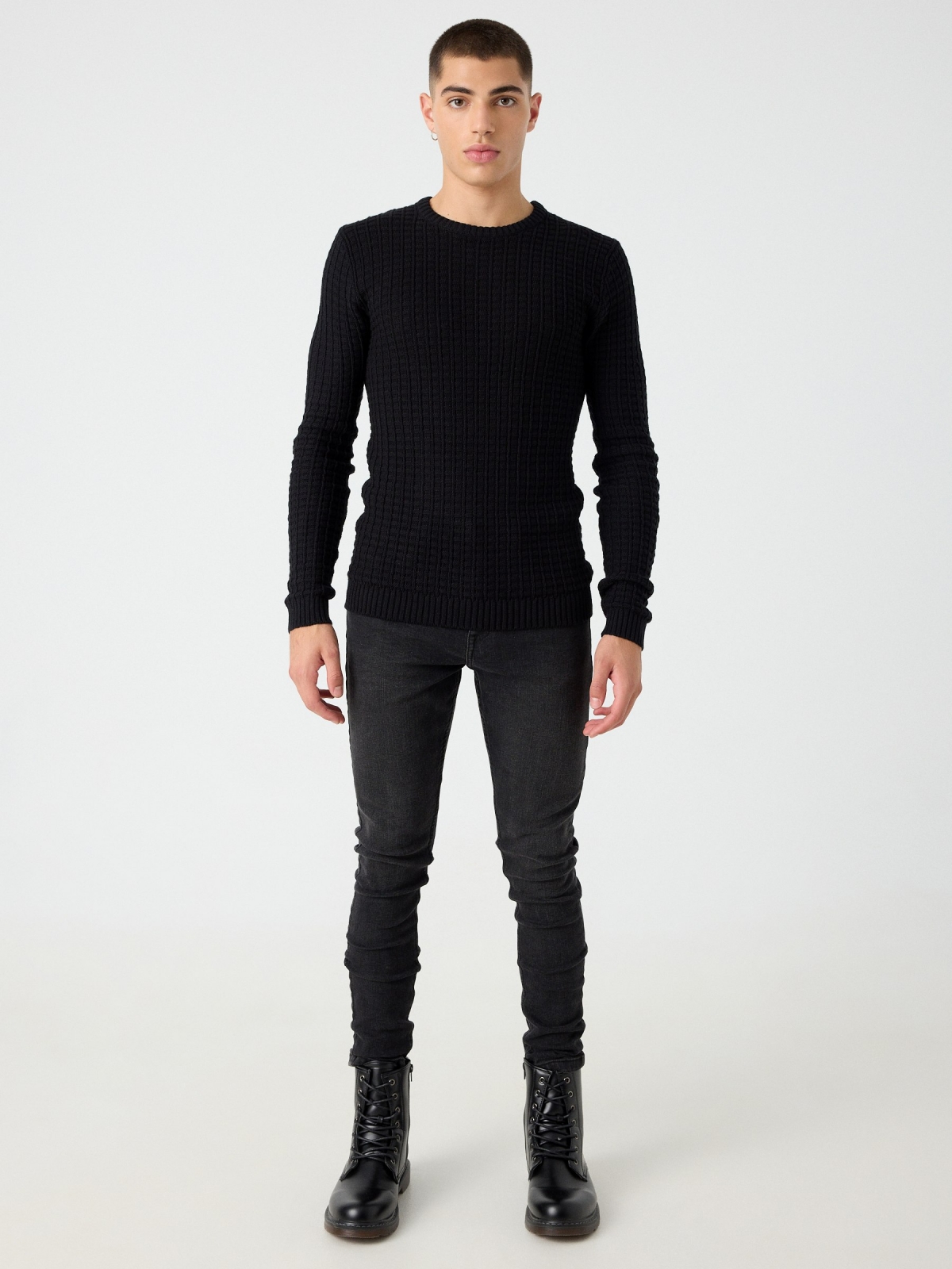 Textured knitted sweater black front view