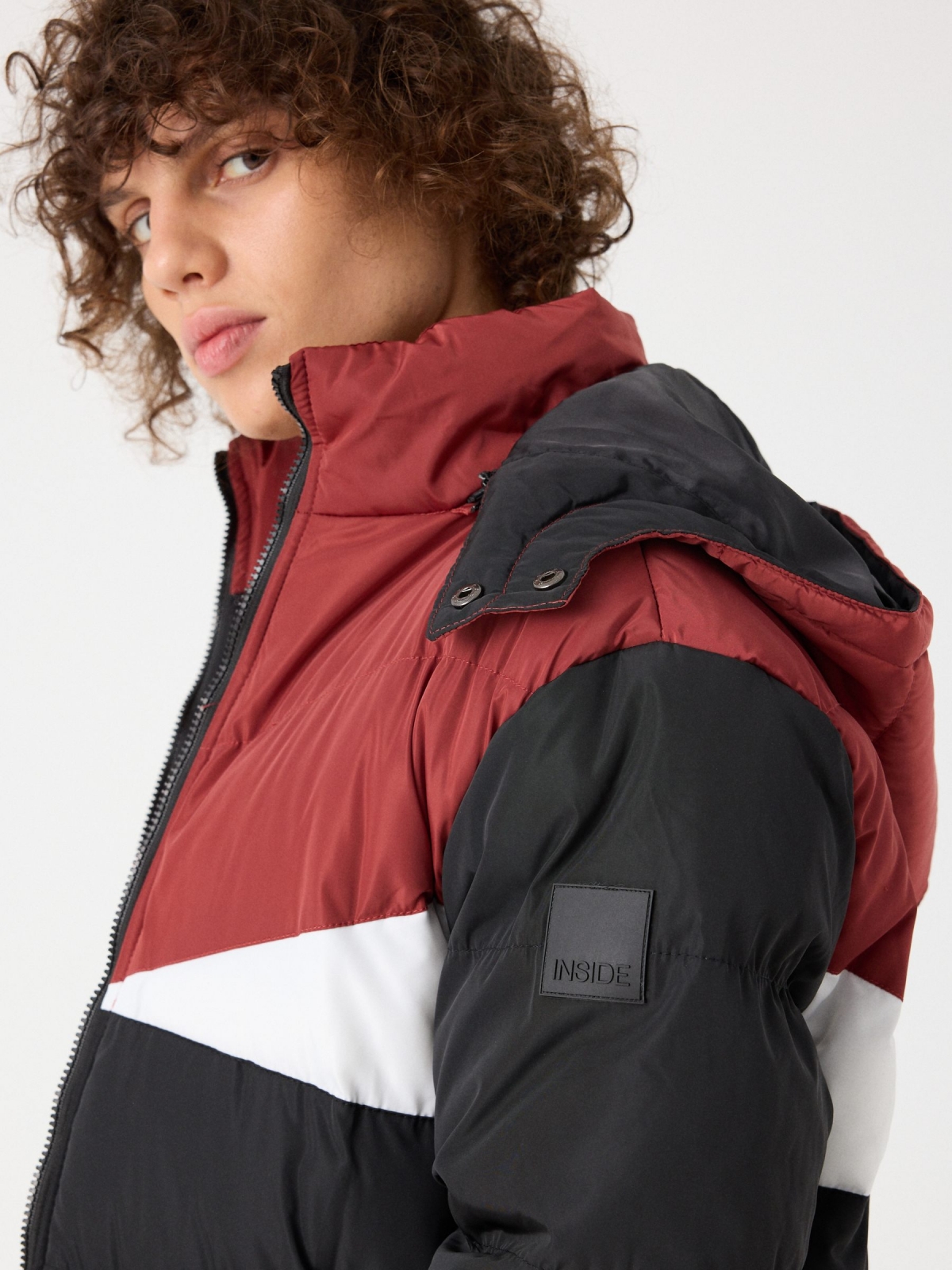 Detachable hood jacket black detail view