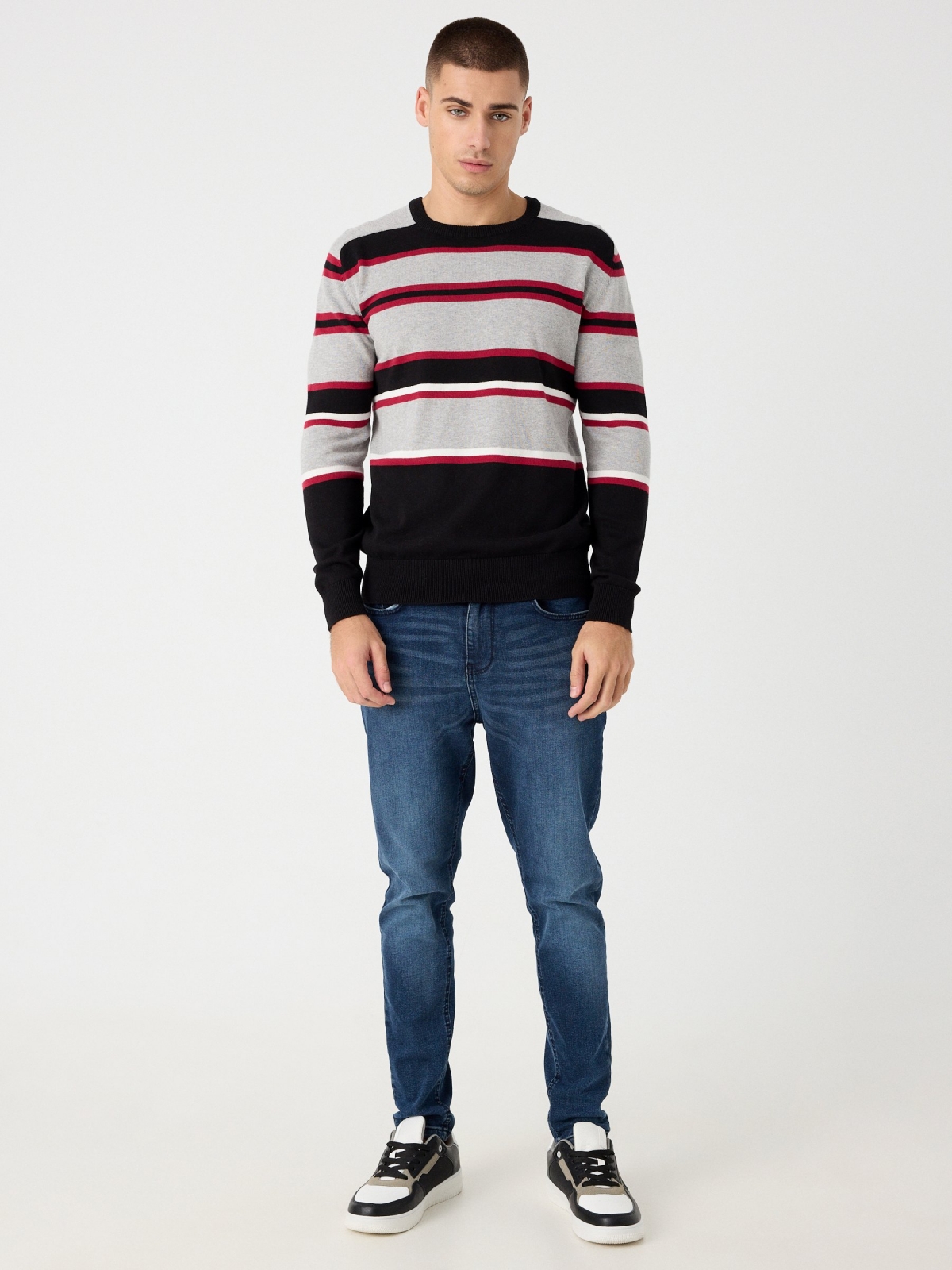Striped knitted sweater black front view