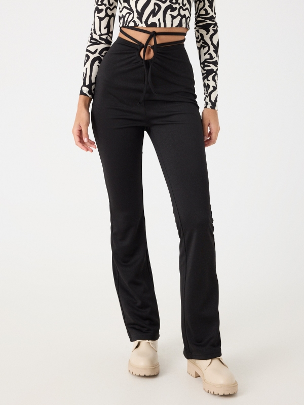 Flared pants with tie waist black middle front view