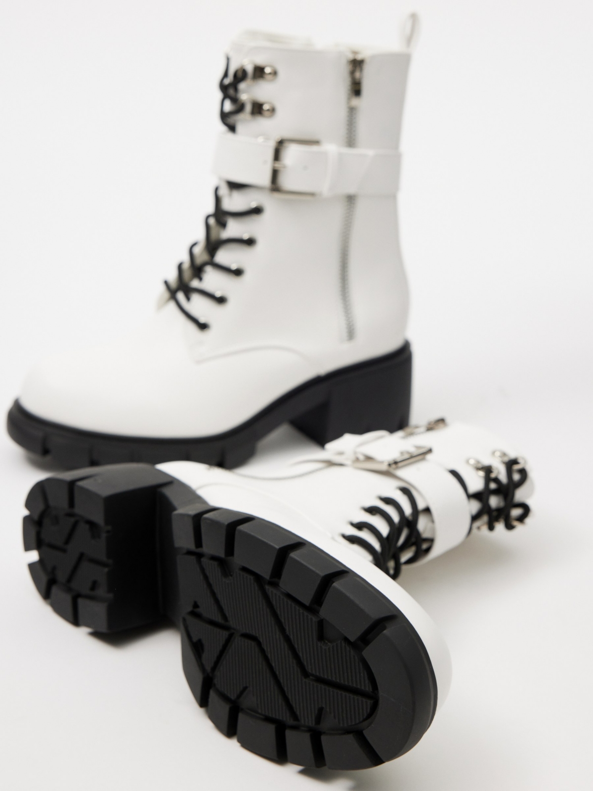 White ankle boot with buckle white detail view