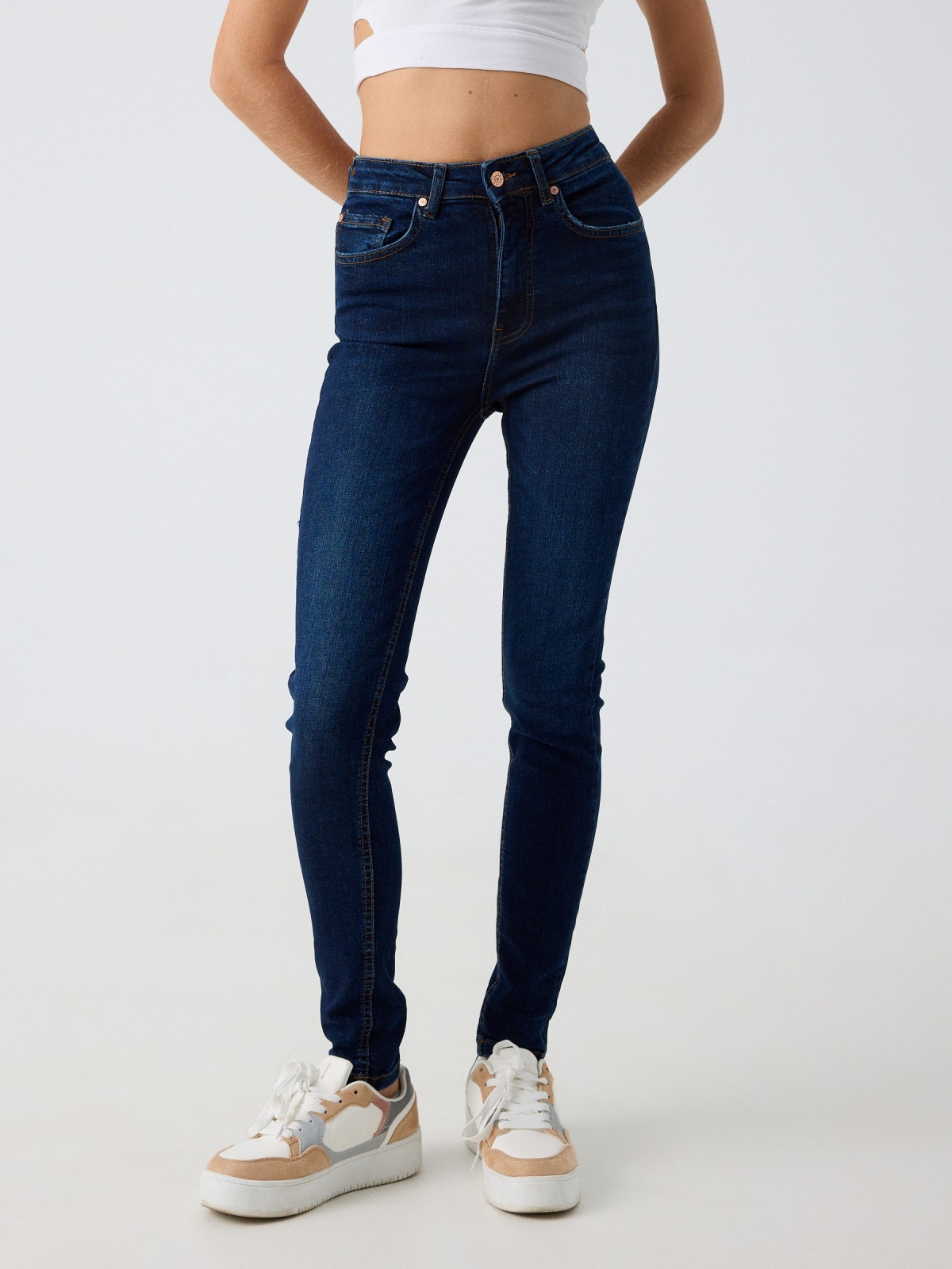 Blue high waisted skinny jeans blue middle front view