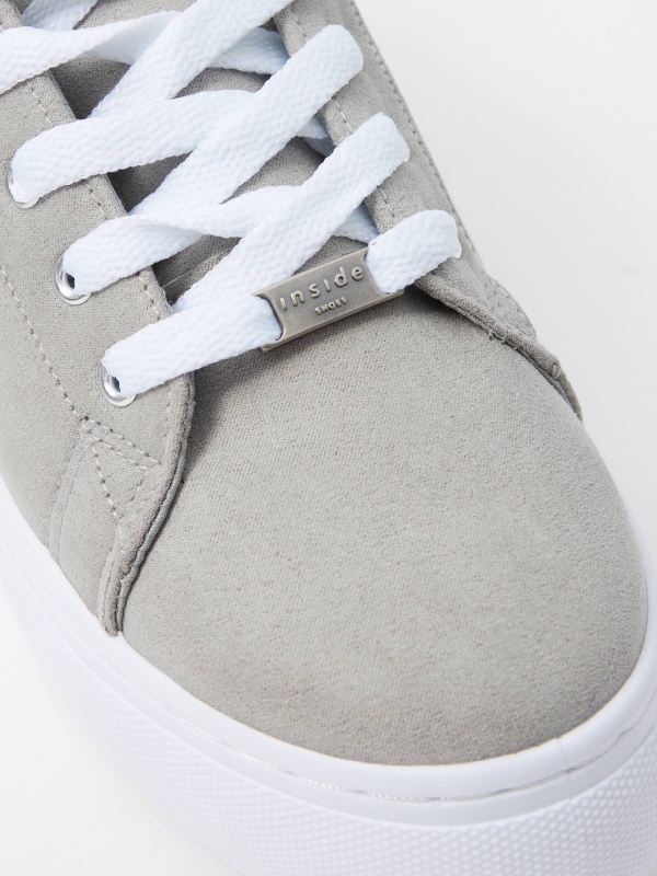 Casual sneaker with silverofmra grey detail view