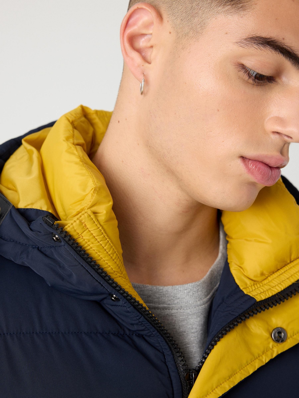 Contrast padded jacket navy detail view