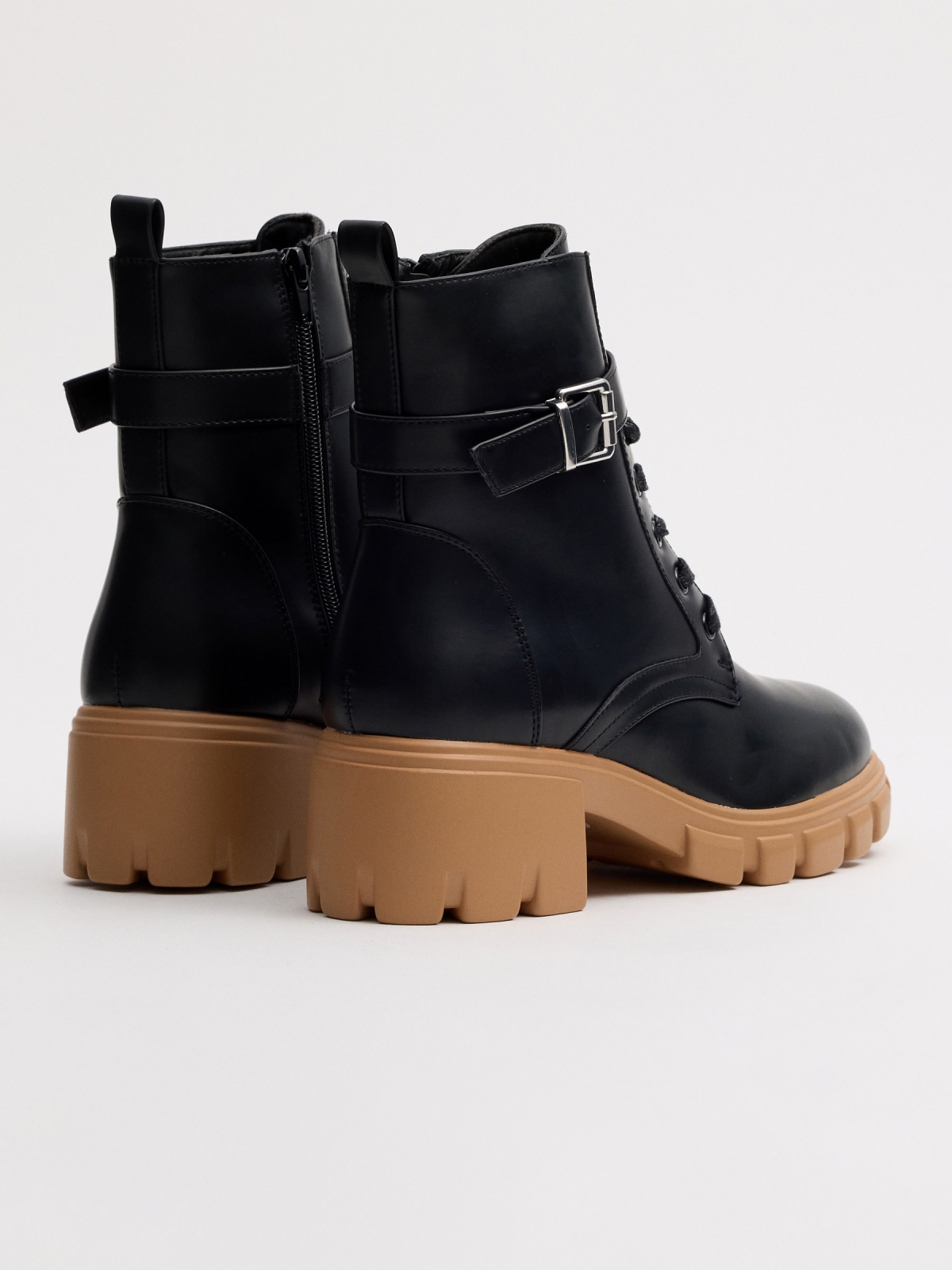 Combined sole boot black 45º back view