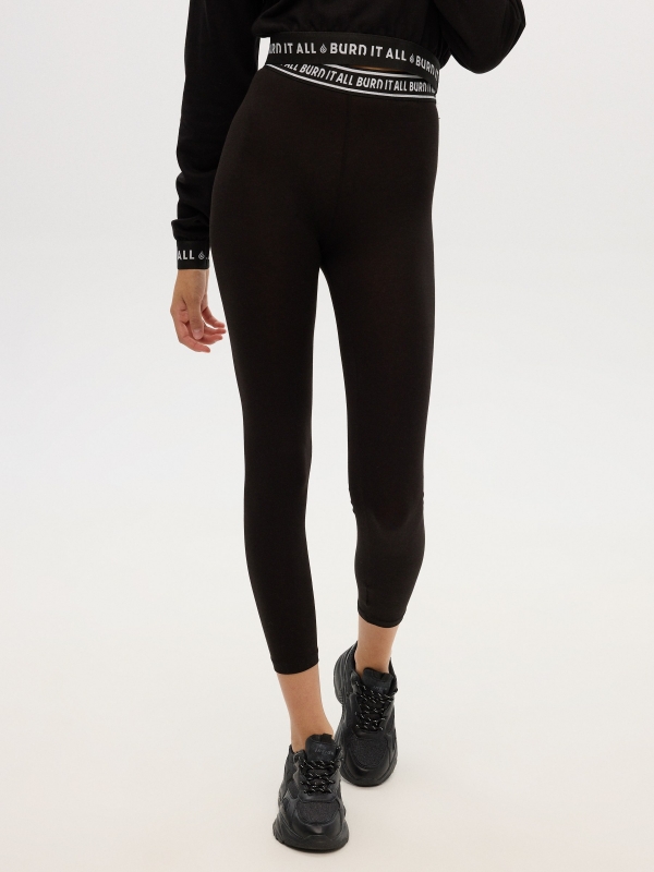 Leggings rubber text black middle front view