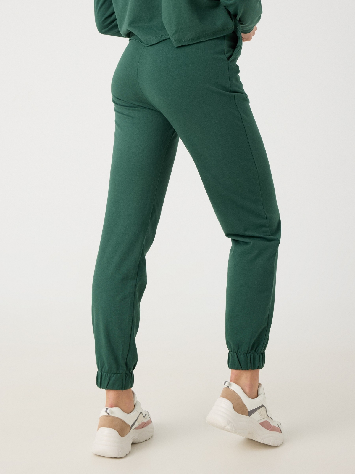 Jogger pants dark green middle back view