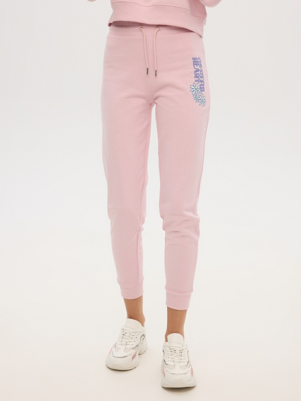 Pink printed jogger pants light pink middle front view