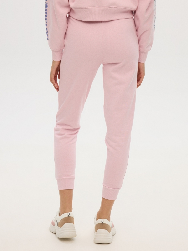 Pink printed jogger pants light pink middle back view
