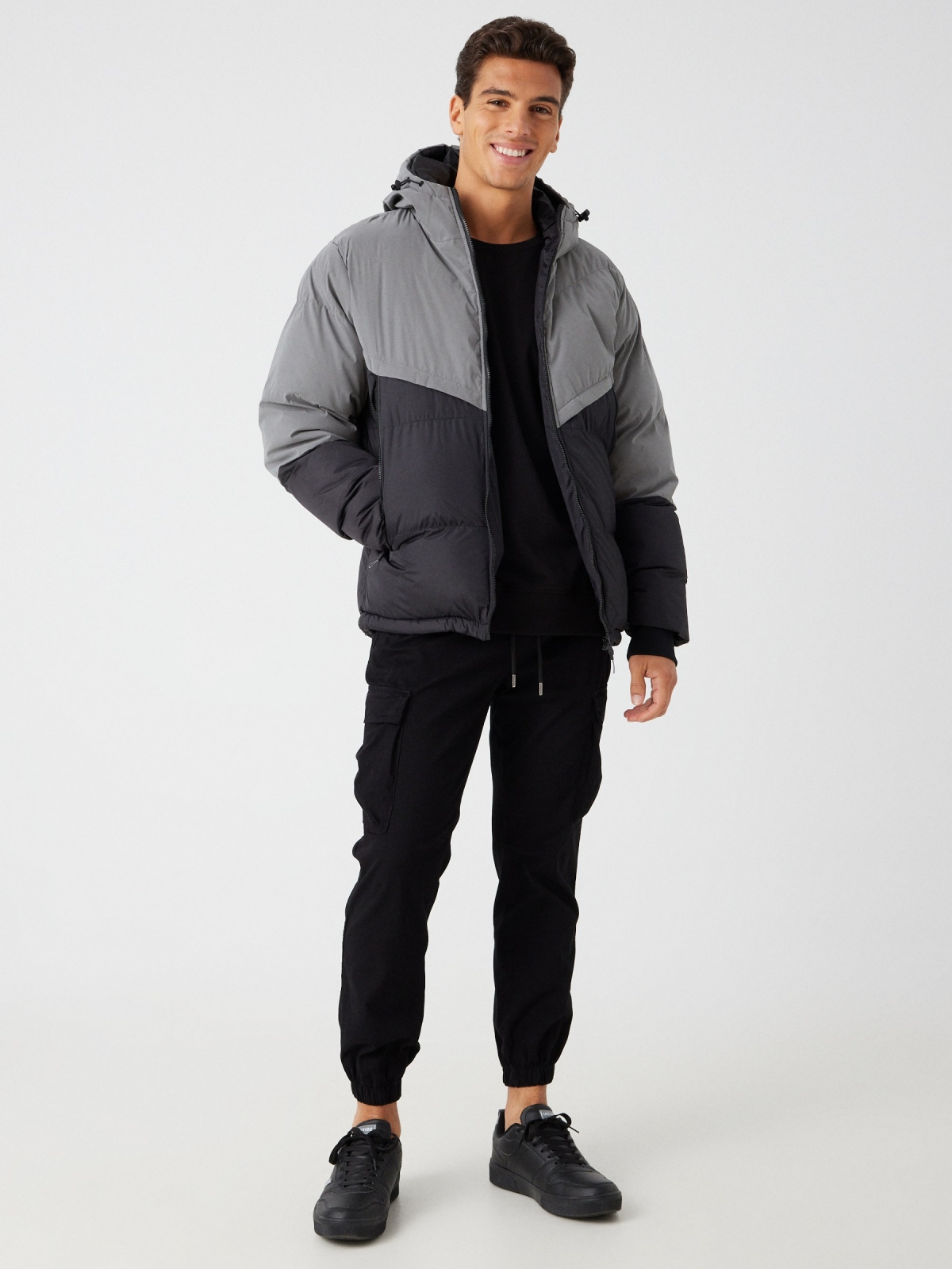 Two-tone padded jacket with hood black front view