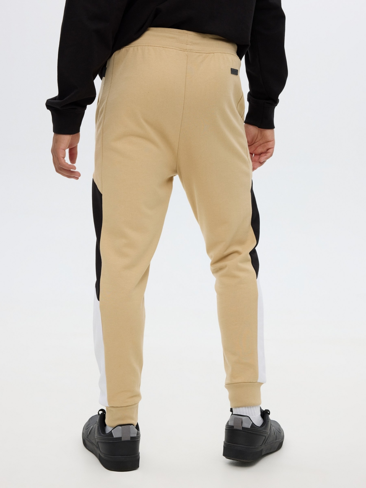 Jogger pants sand middle back view