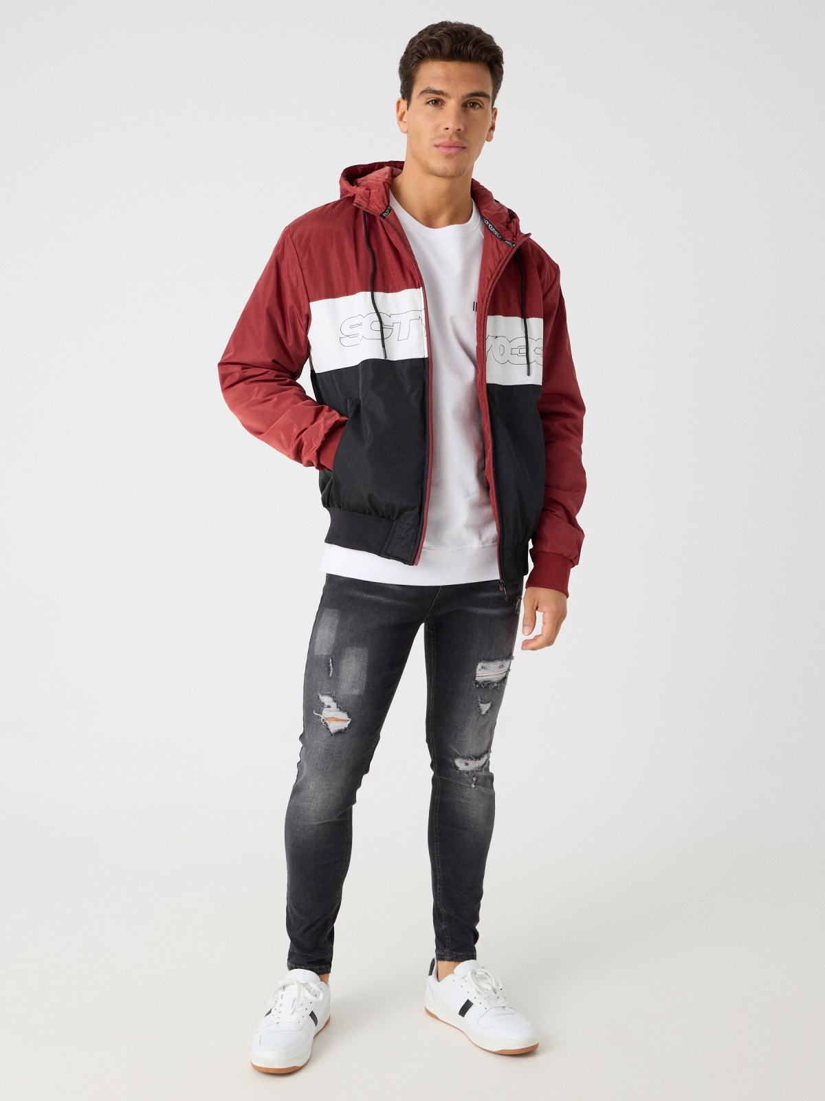 Quilted color block jacket with text red front view