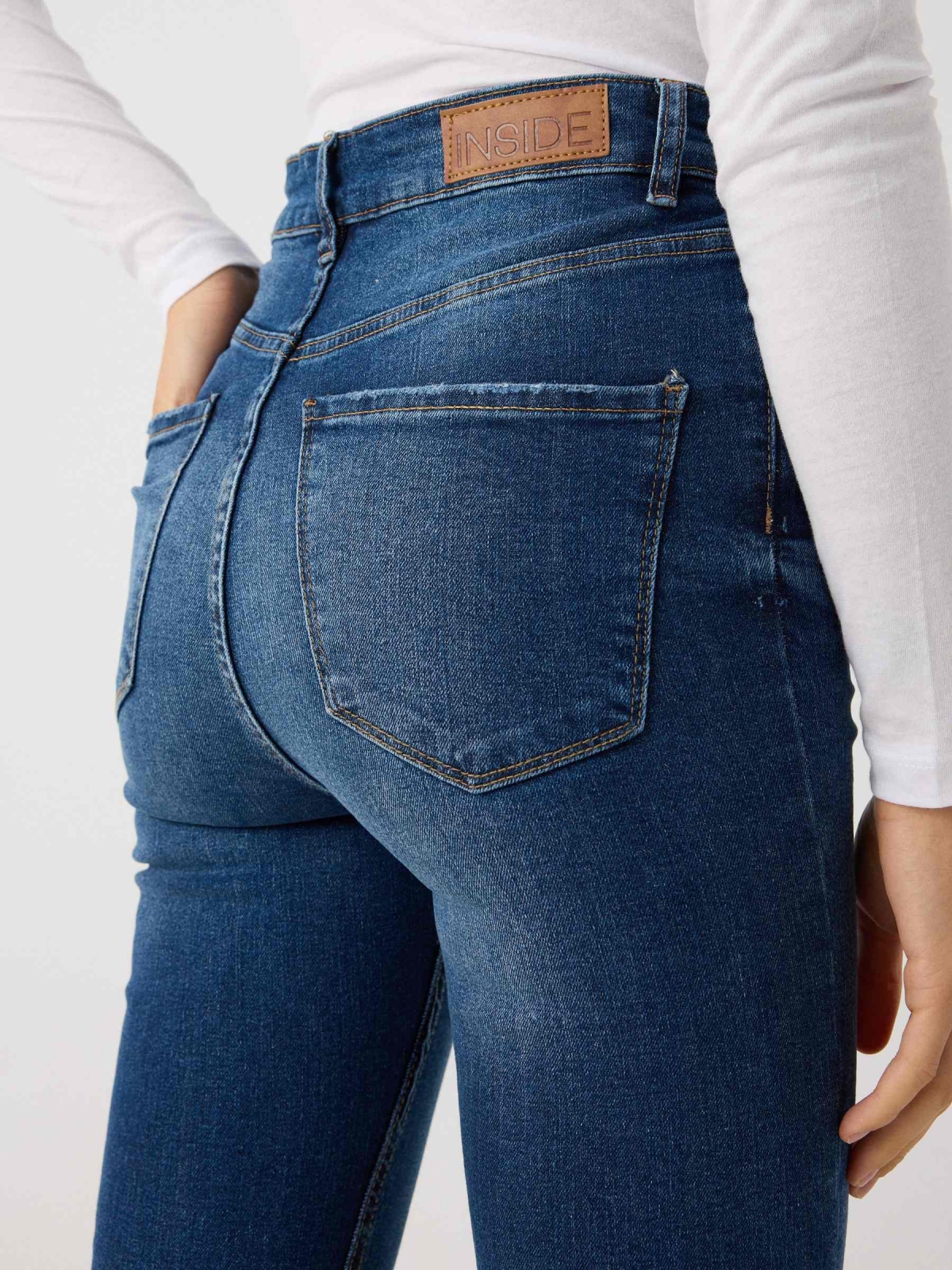 Blue high waisted five pocket skinny jeans blue detail view