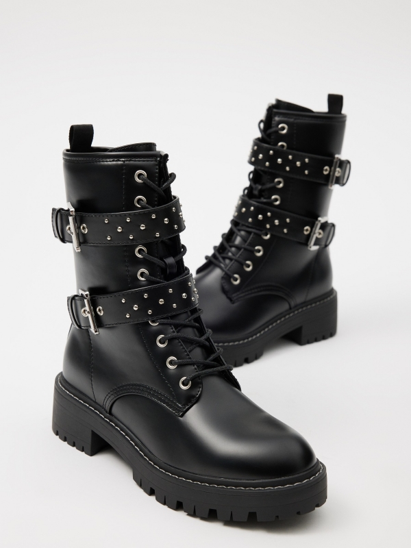 Ankle boot with buckles and studs black detail view