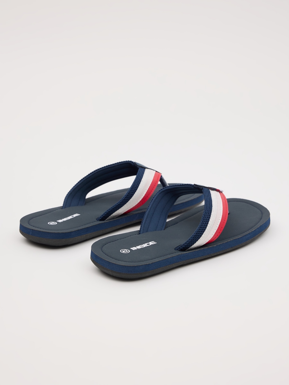 Thong sandal with strap navy 45º back view