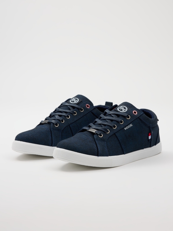 Navy blue canvas sneaker navy 45º front view