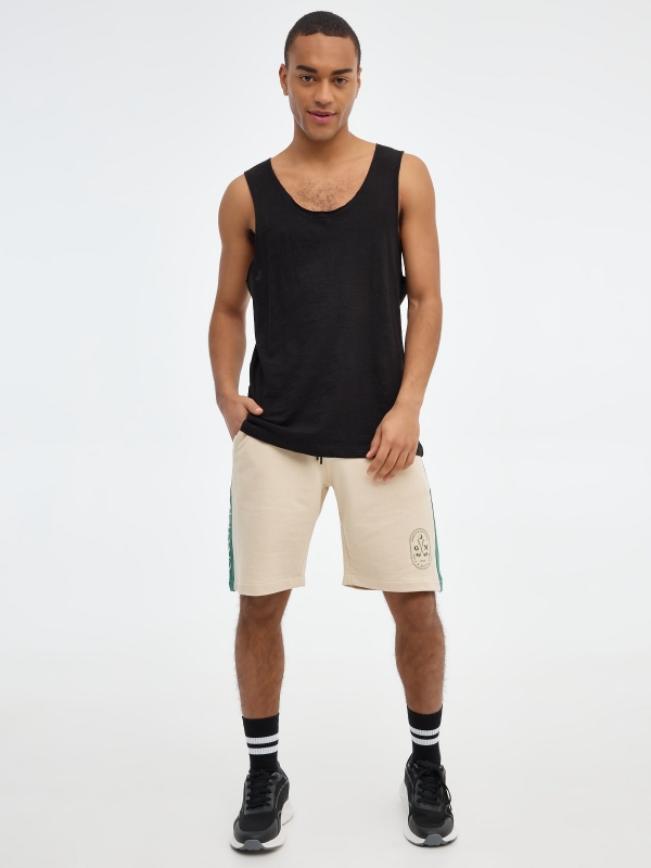 Bermuda jogger shorts with side bands sand front view