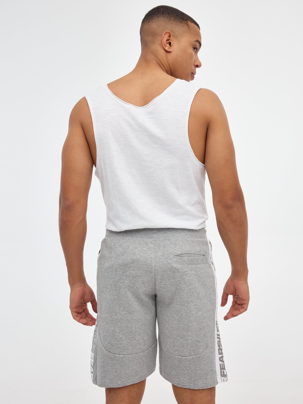 Bermuda jogger shorts with text grey middle back view