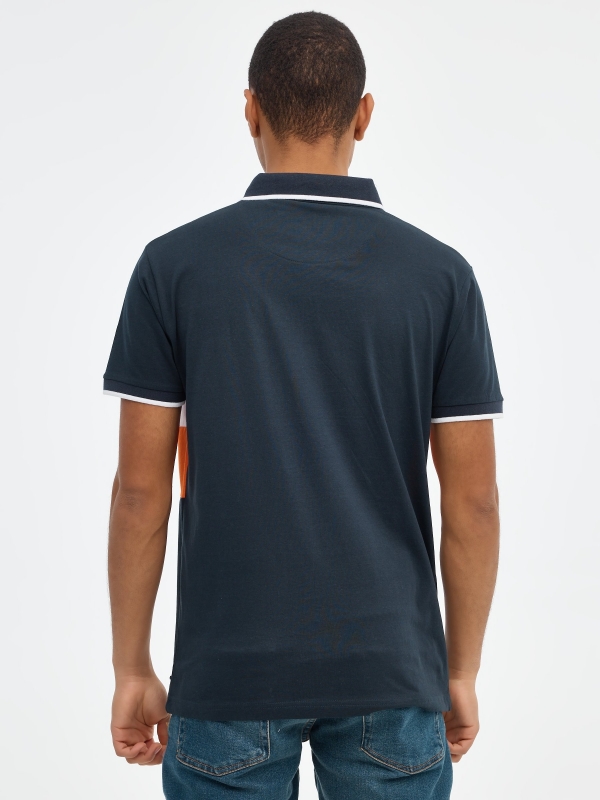Orange and white color block polo shirt navy middle back view