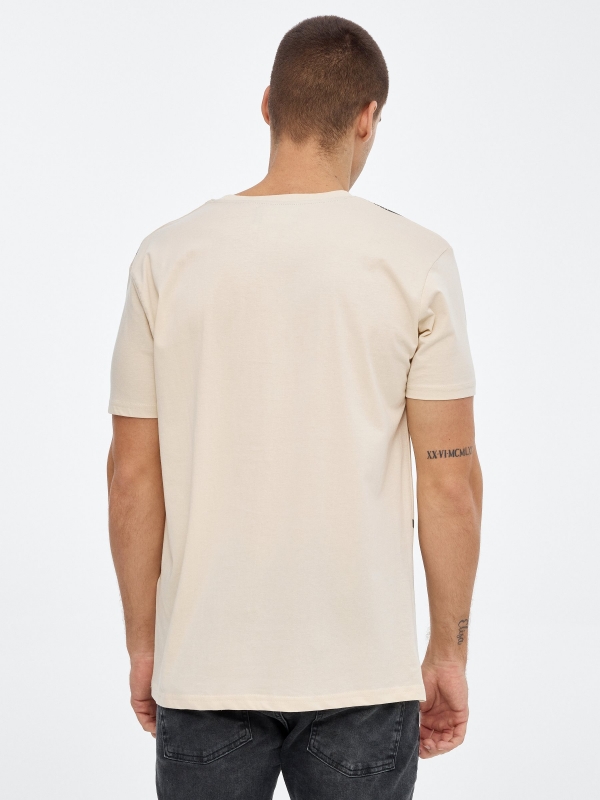 Graffiti printed t-shirt sand middle back view