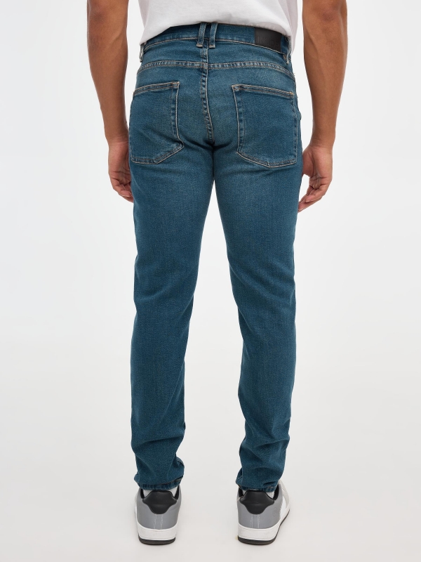 Basic slim jeans blue middle back view