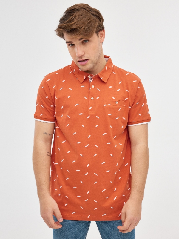 Feather print polo shirt brick red middle front view