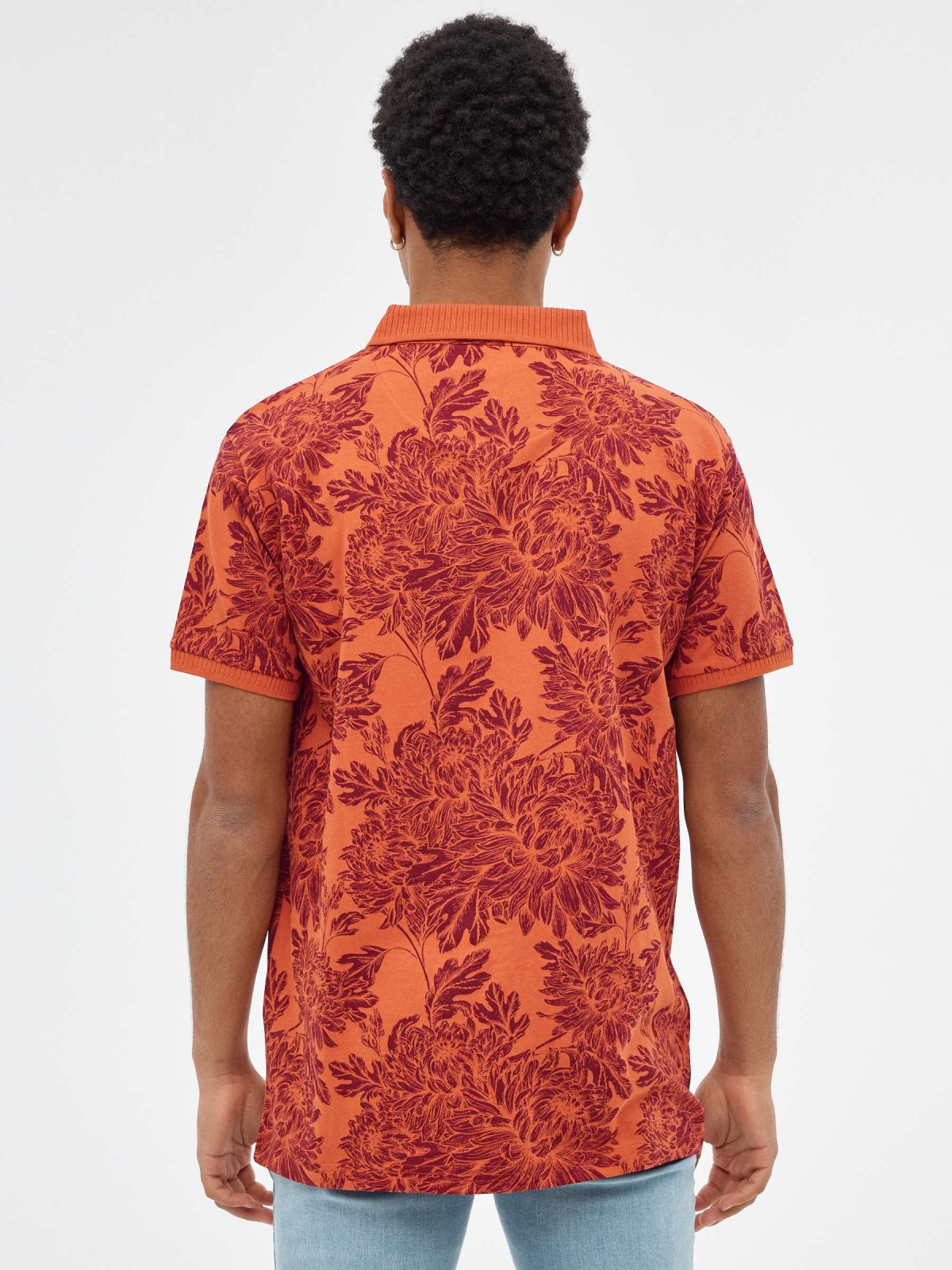 Floral print polo shirt brick red middle back view