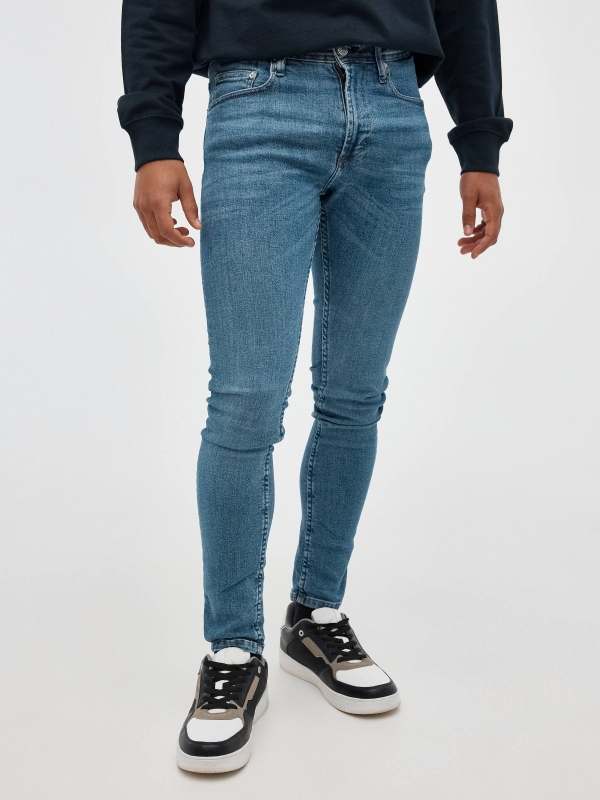 Blue skinny jeans blue middle front view