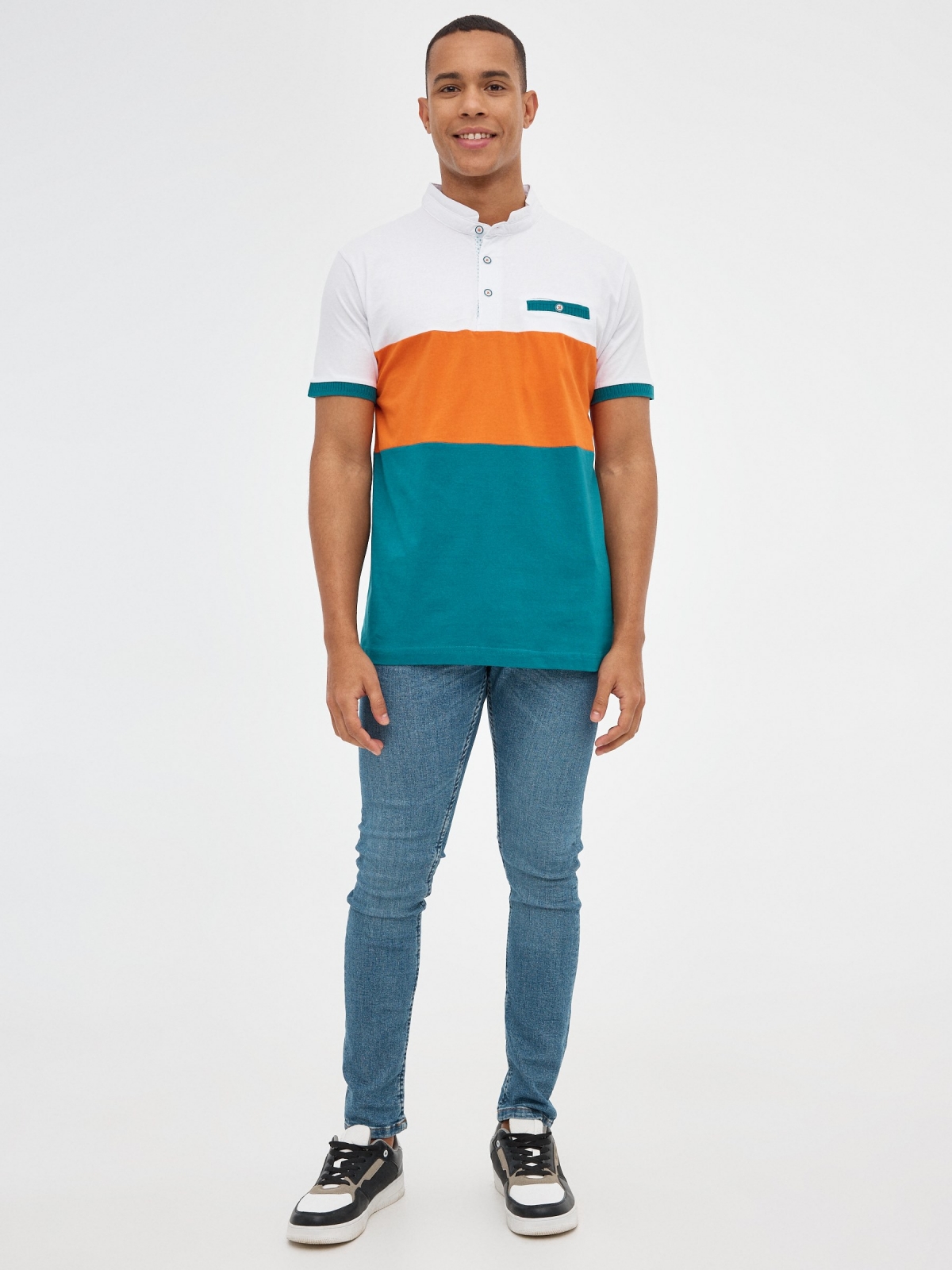 Camisa pólo em bloco a cores esmeralda vista geral frontal