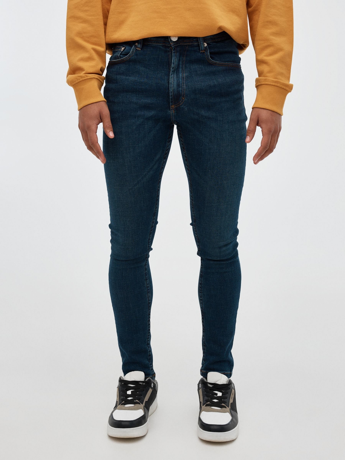 Dark blue skinny jeans blue middle front view