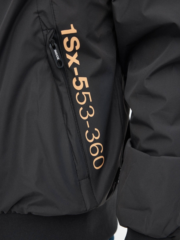 Lightweight nylon jacket B/W dark grey detail view