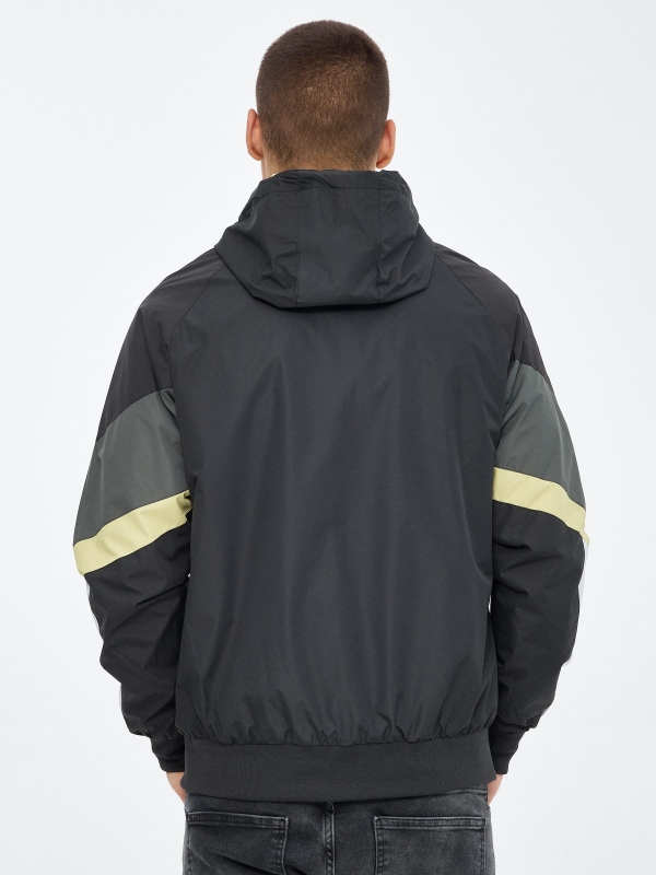 Lightweight hooded jacket dark grey middle back view