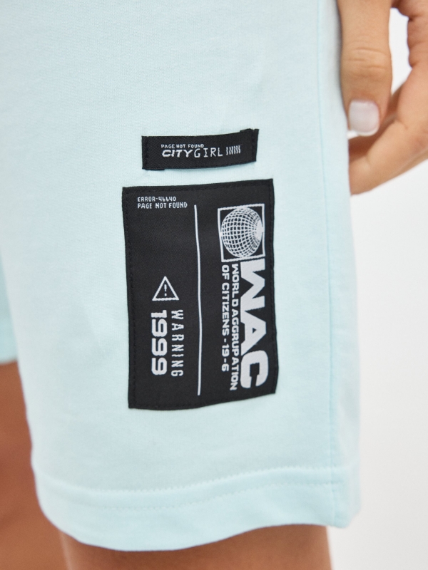 Plush bermuda shorts with elastic blue detail view