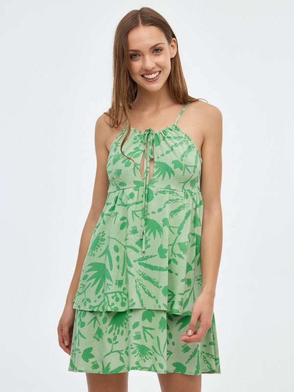 Mini print dress with ruffle light green middle front view