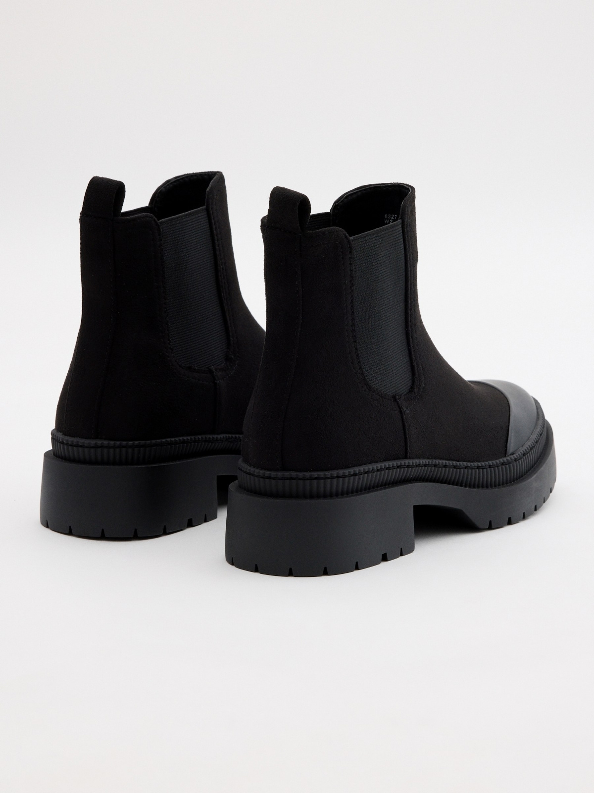 Chelsea ankle boot toe black 45º back view