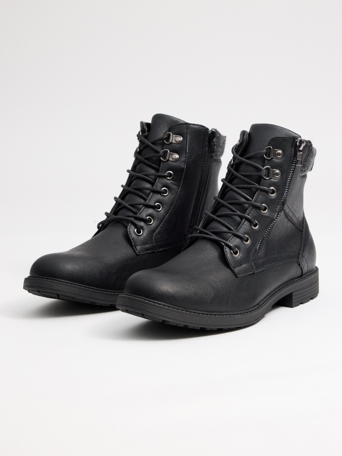 Black boot with zipper detail black 45º front view