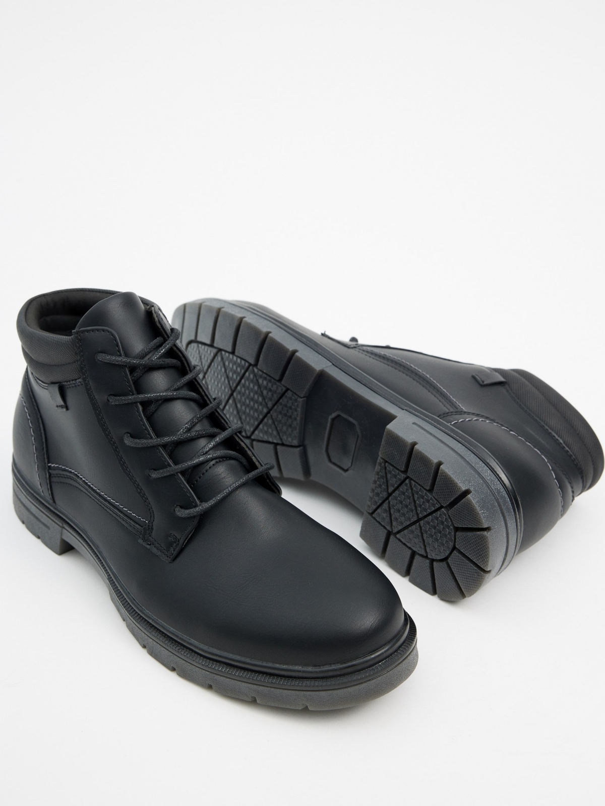 Black leather effect boots with stitching black detail view