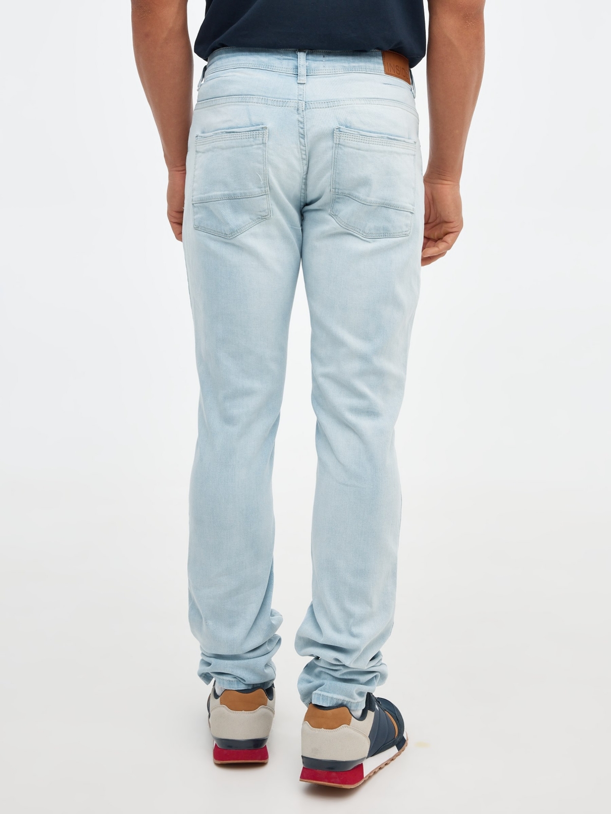 Light blue slim jeans blue front view