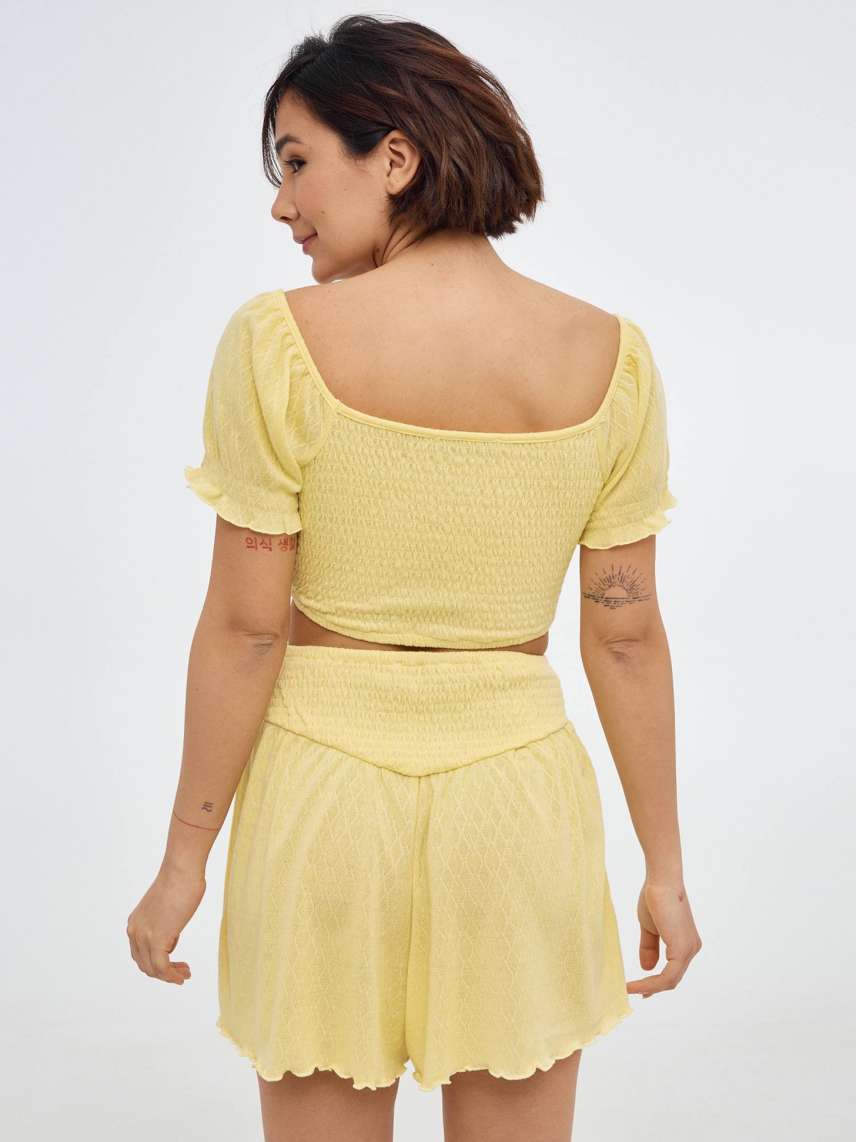 Jacquard shorts pastel yellow middle back view