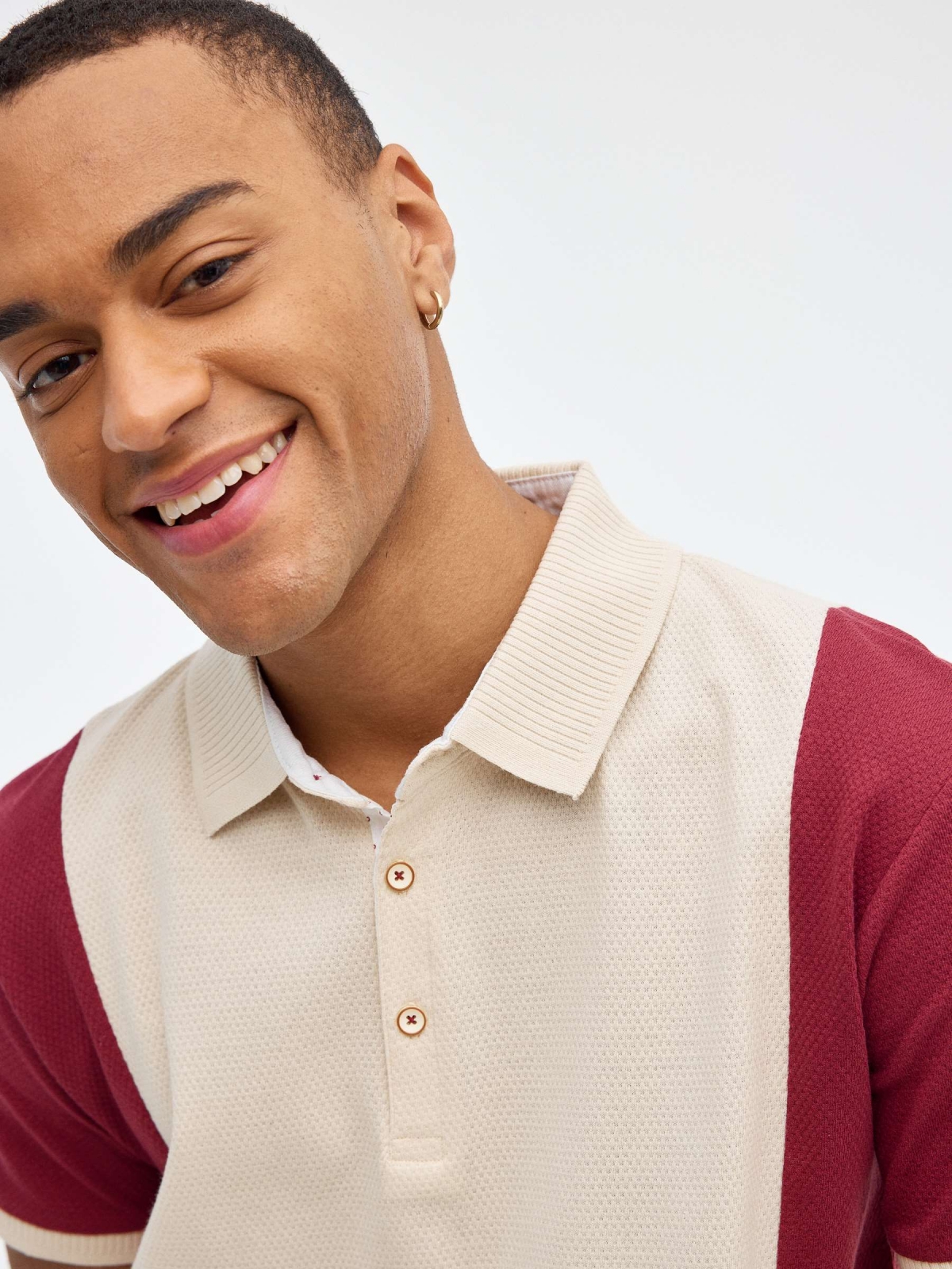 Maroon color block polo shirt sand detail view