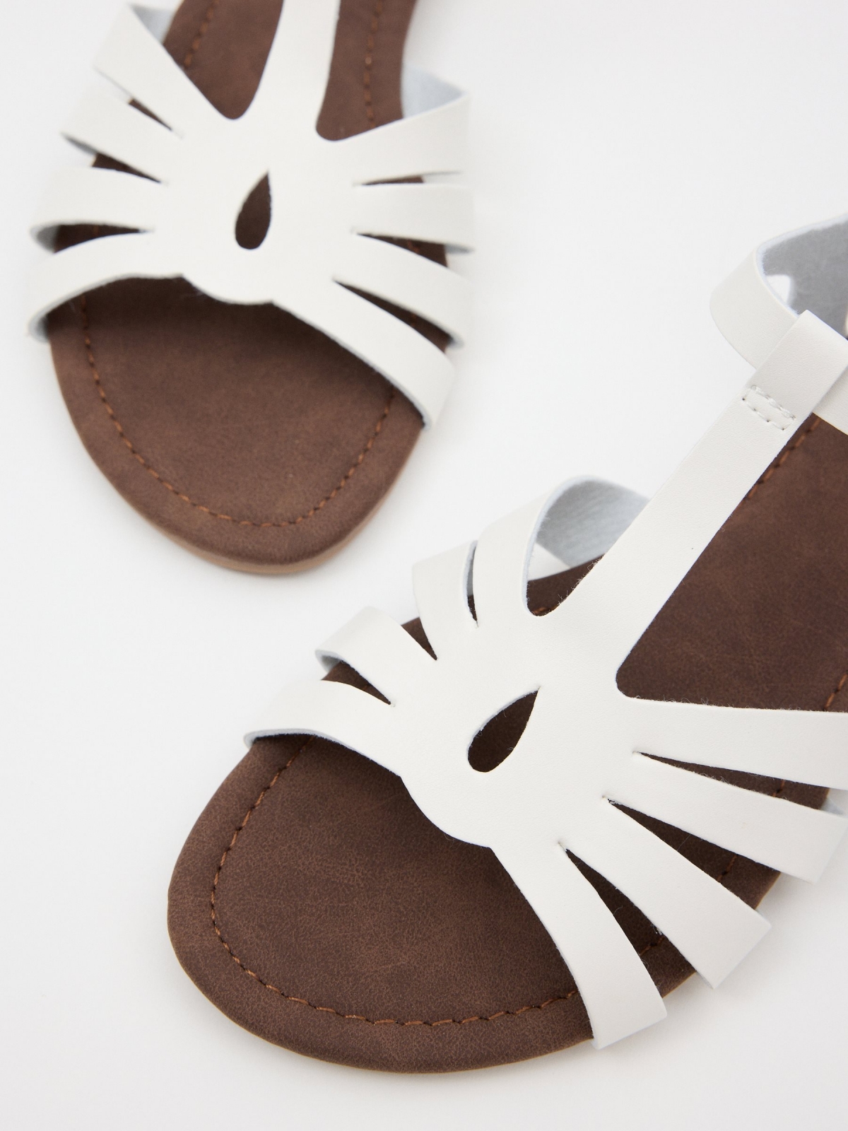 Sandals with crossed straps white detail view