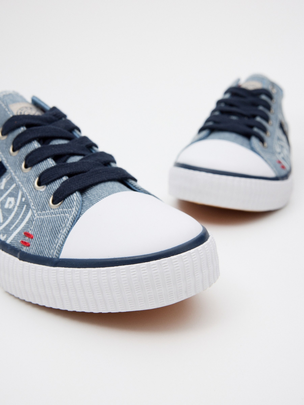 Casual canvas sneaker with toe cap steel blue detail view