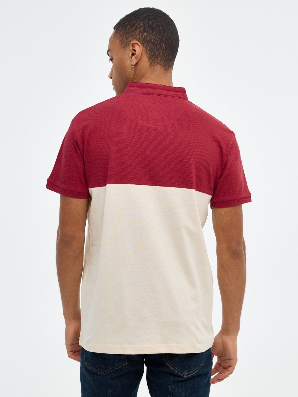 Maroon mao polo shirt sand middle back view