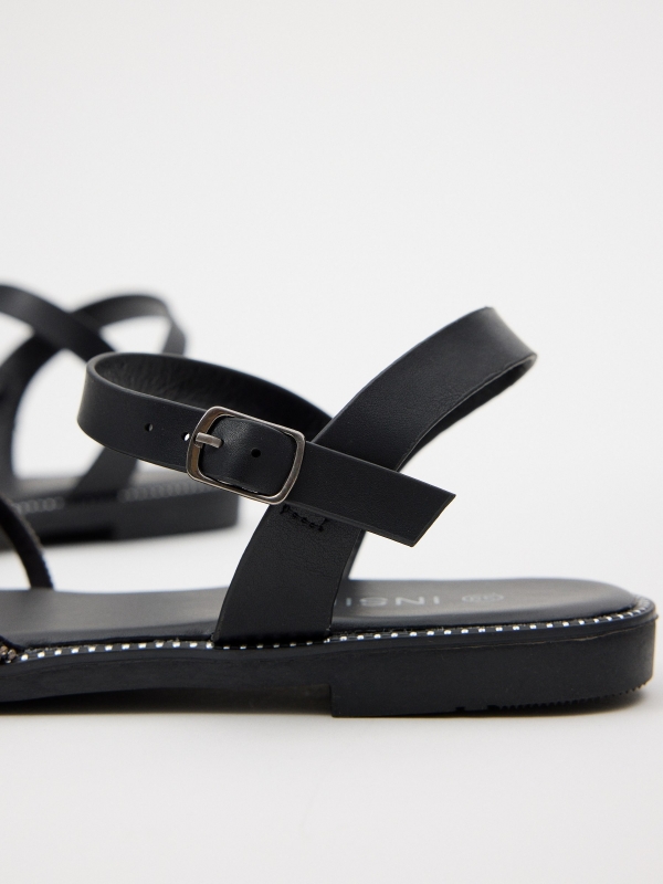 Sandal with shiny patent leather straps black detail view
