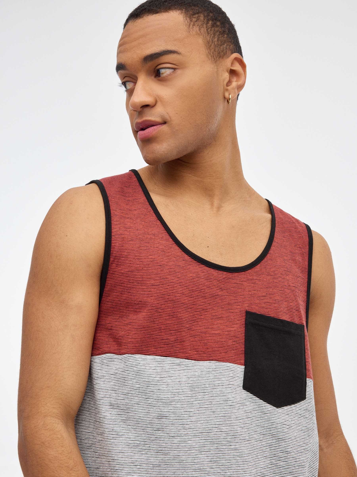 Tank top with pocket brick red detail view