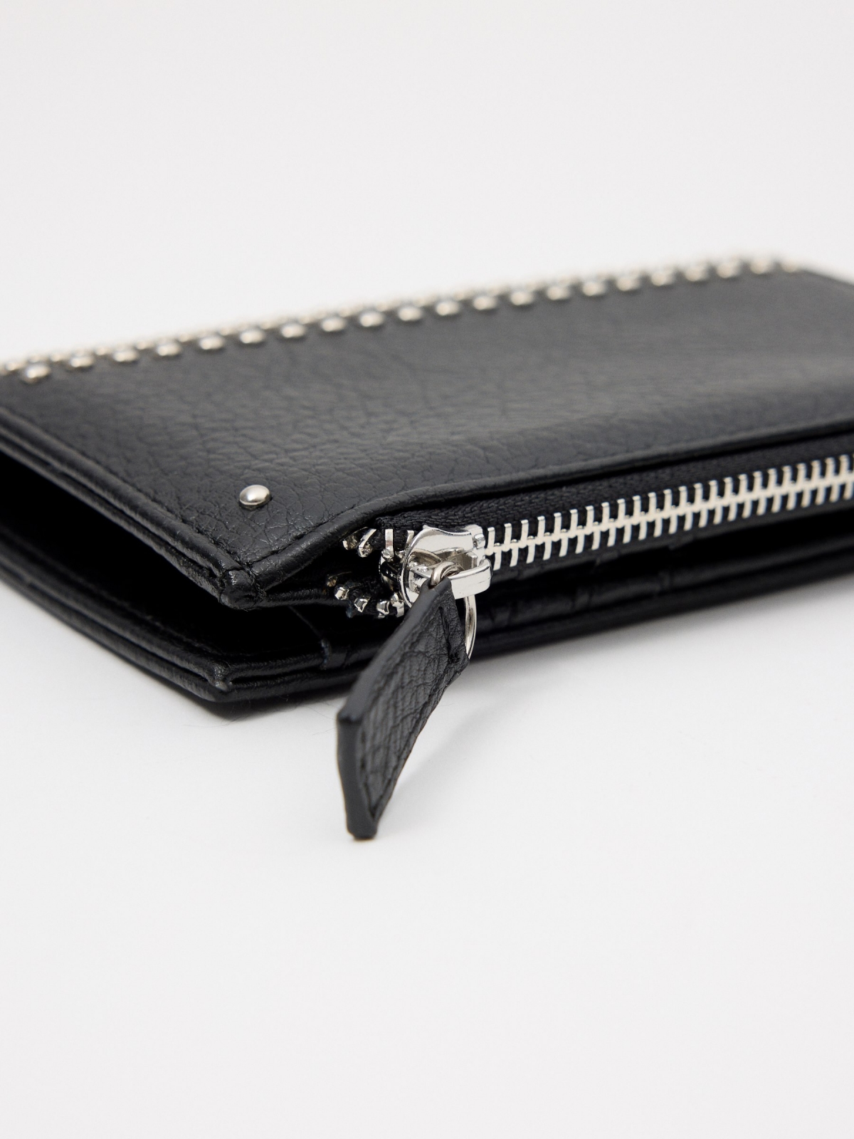 Black purse with studs black 45º side view